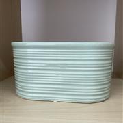 Oval ribbed green pot